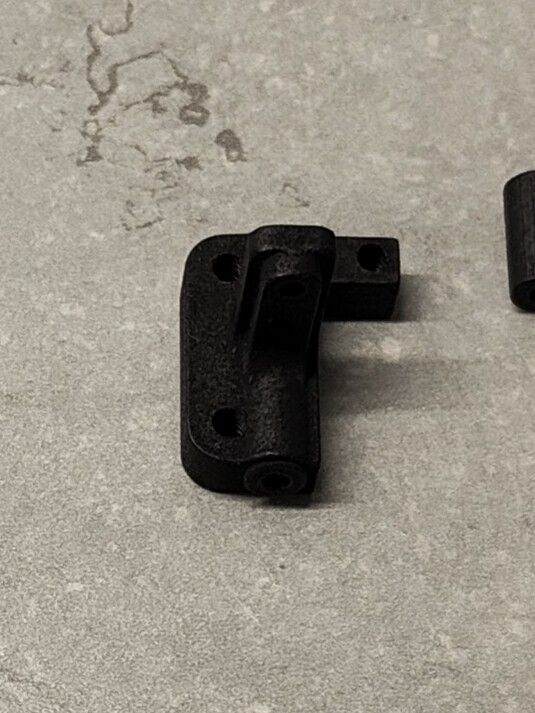 Yokomo Works 94-95 rear lower arm mounts, pair