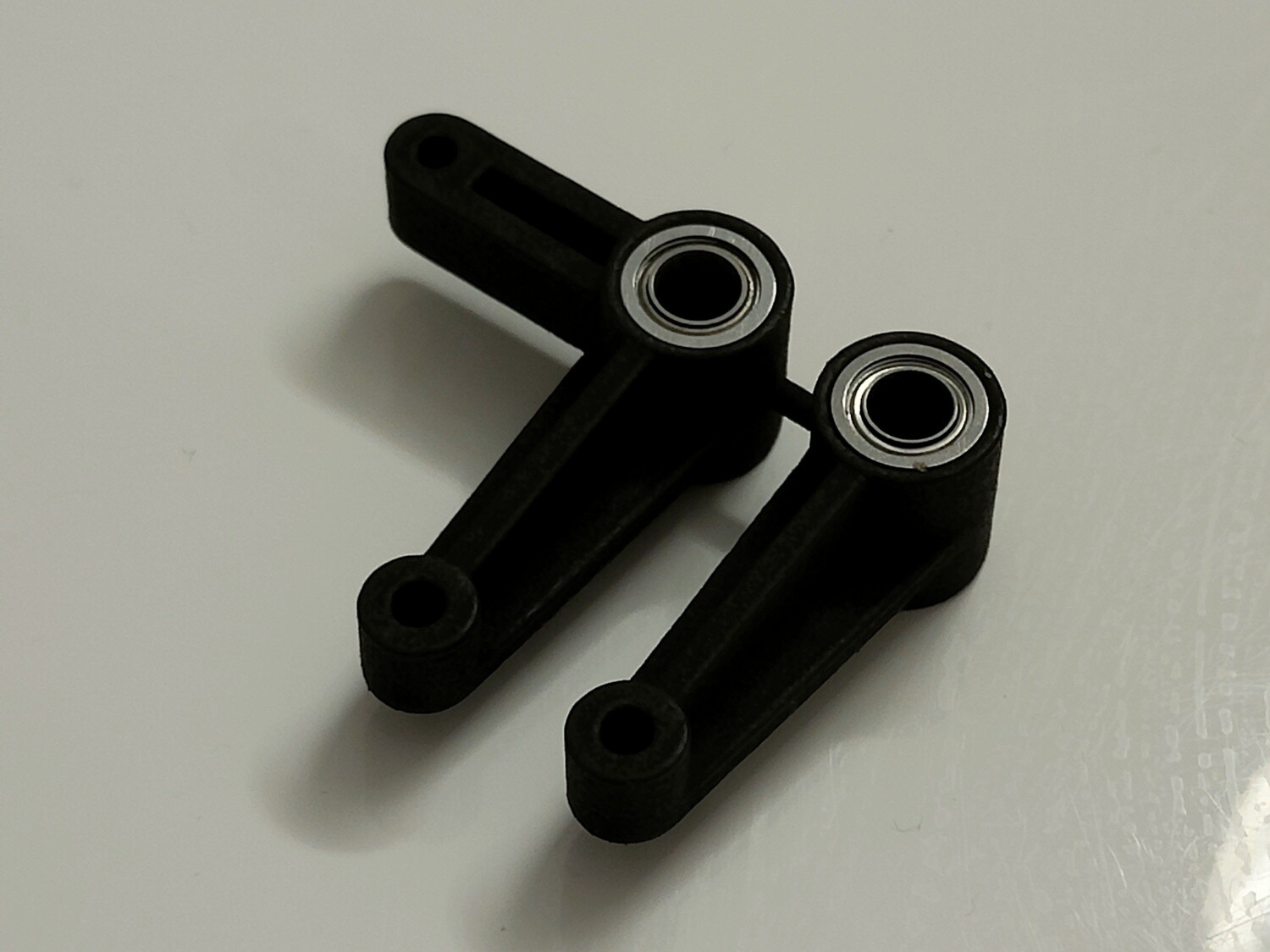 Losi JrX series ballraced steering arms, with bearings.