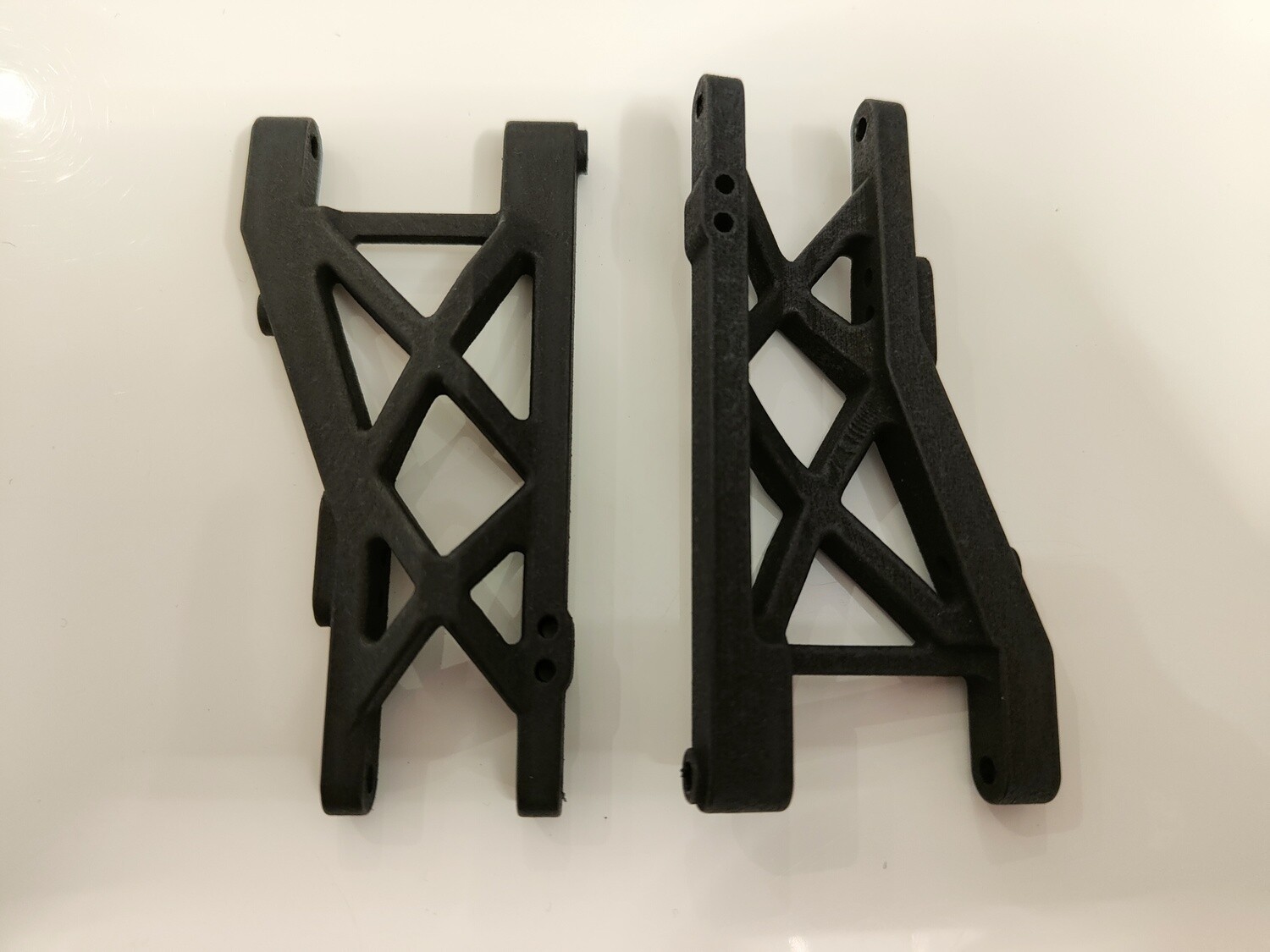 Schumacher Cat 2000 rear arms, pair