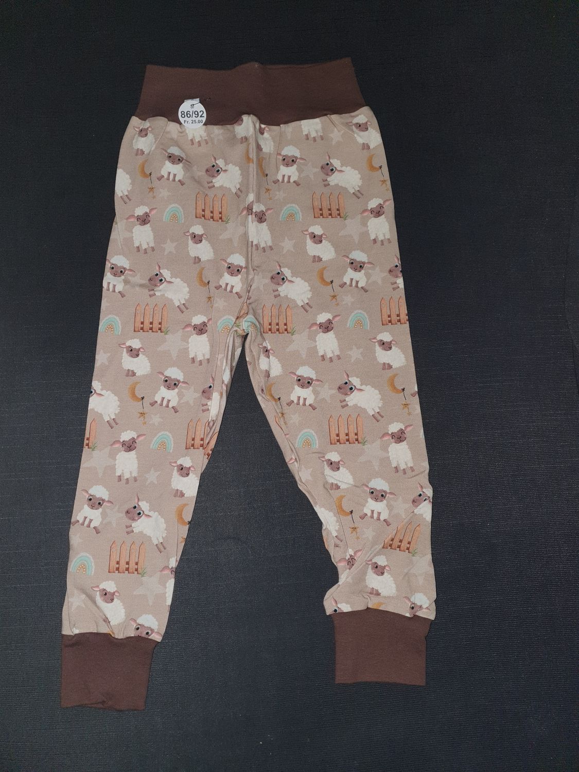 74/80, Hösli Schäfchen, braun