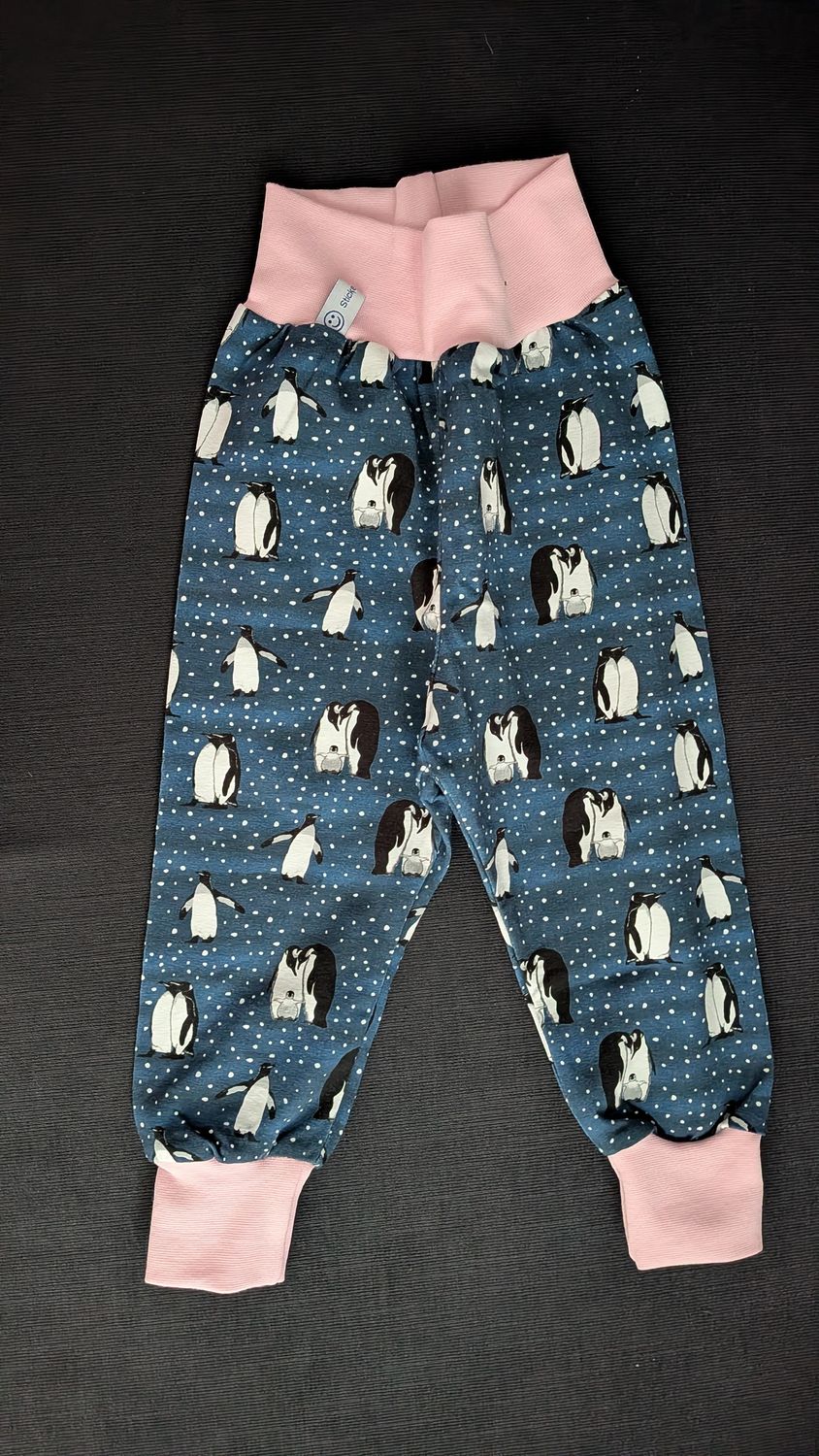 74/80, Hösli Pinguin auf navy mit rosa Bündchen