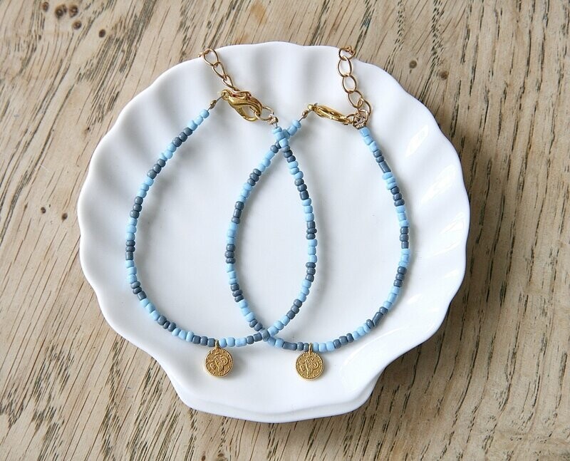blauw/goud munt armbandje