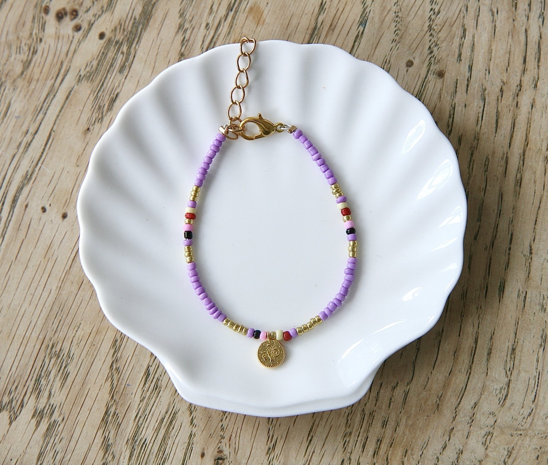 paars-roze-rood-geel-zwart armbandje