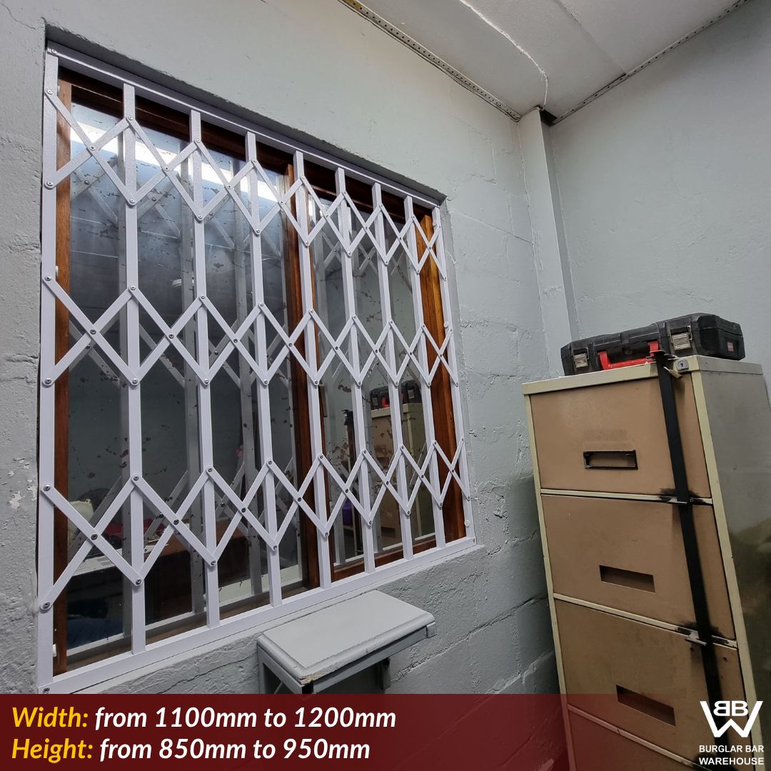 Medium wide aluminium burglar bars installed on a residential window, providing effective security while maintaining airflow.