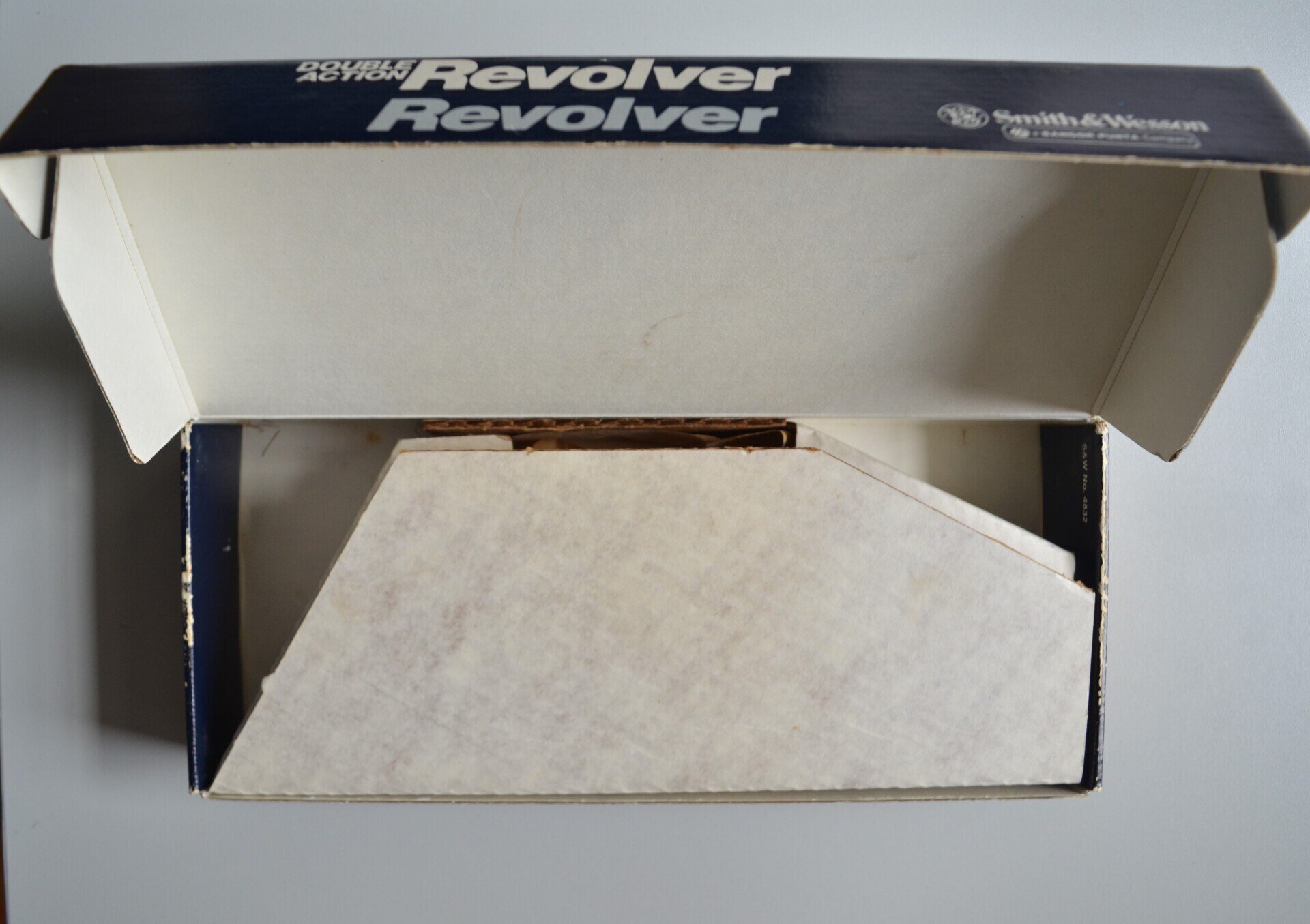 S&W	One-piece blue cardboard box