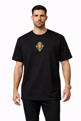 male model wearing dolce gabbana gold skull emblem black designer t shirt luxury fashion