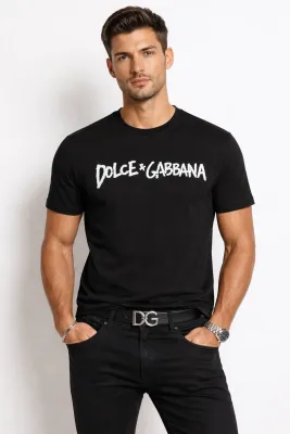 Male model wearing black Dolca Gabbana logo embroidered t shirt luxury designer fashion style