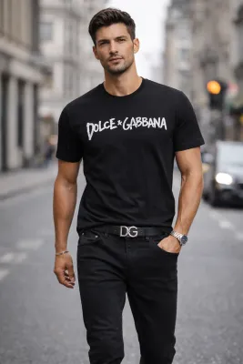 Male model walking in city wearing Dolce Gabbana black t shirt mens luxury designer outfit