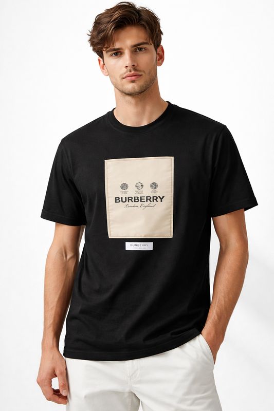 Burberry black logo patch men's t-shirt worn by male model front view luxury designer outfit