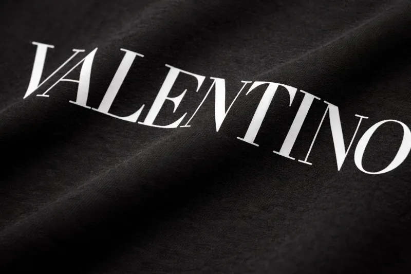 Valentino black tee shirt for men fabric texture and logo macro detail