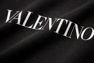 Valentino black tee shirt for men fabric texture and logo macro detail