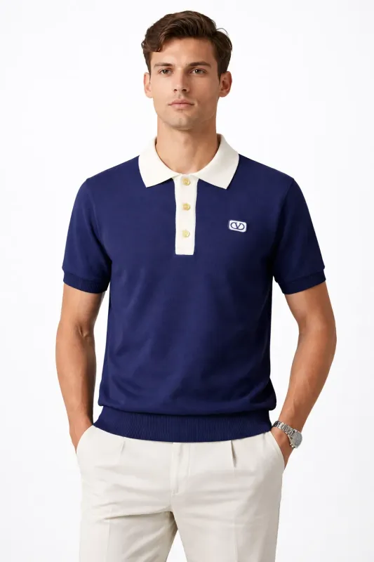 Valentino navy blue knit polo shirt on male model front straight pose studio shot