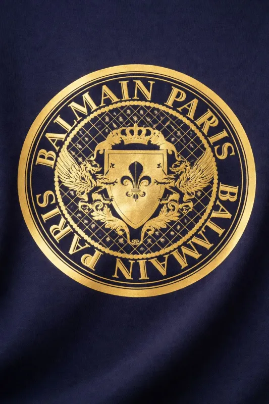 Balmain gold logo graphic t shirt navy close up luxury designer crest logo detail
