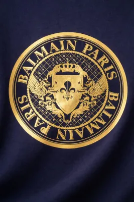 Balmain gold logo graphic t shirt navy close up luxury designer crest logo detail