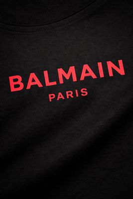 Balmain Paris red logo print detail on black men’s luxury T-shirt