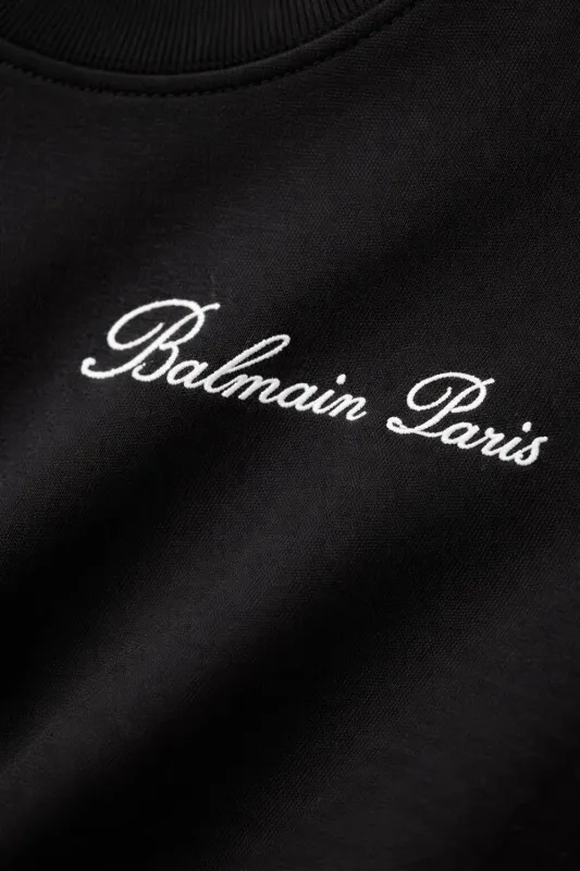 Balmain minimal logo t shirt black script logo embroidered luxury tee shirt detail