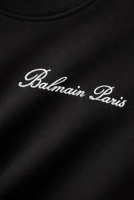 Balmain minimal logo t shirt black script logo embroidered luxury tee shirt detail