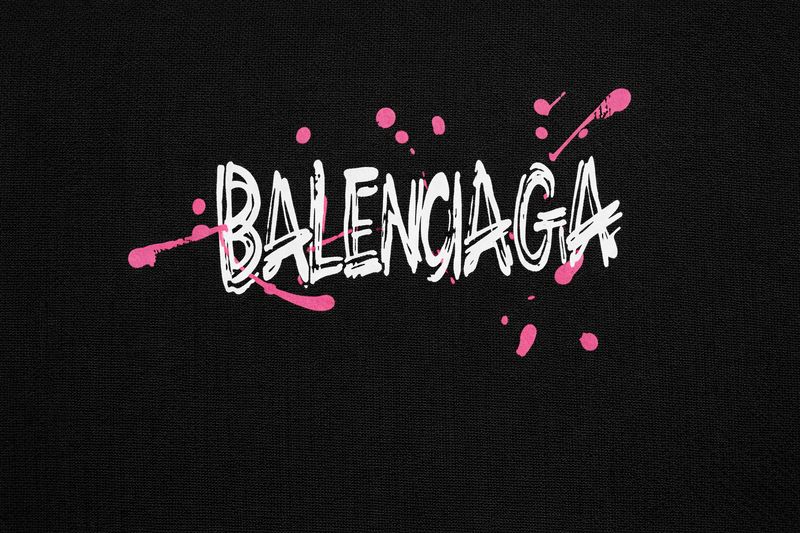 Balenciaga graffiti logo close-up detail on black men’s t-shirt