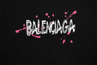 Balenciaga graffiti logo close-up detail on black men’s t-shirt