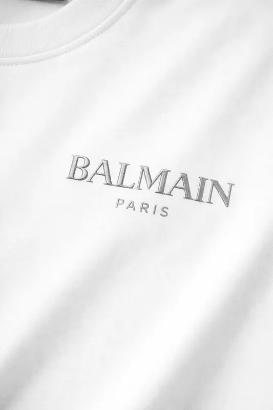 Balmain t shirt silver logo close up silver designer shirt white designer tee