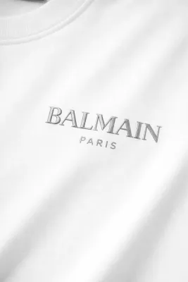 Balmain t shirt silver logo close up silver designer shirt white designer tee