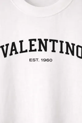 Valentino white mens t shirt fabric texture and black logo macro detail