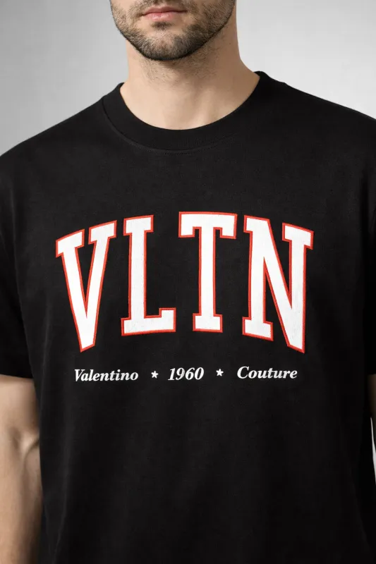 Valentino men's designer shirt with logo black VLTN premium editorial chest crop on male model