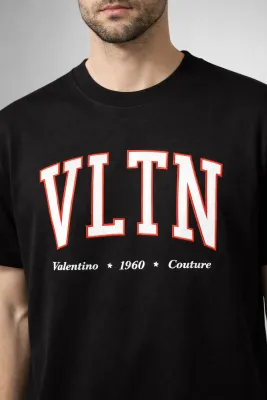 Valentino men's designer shirt with logo black VLTN premium editorial chest crop on male model