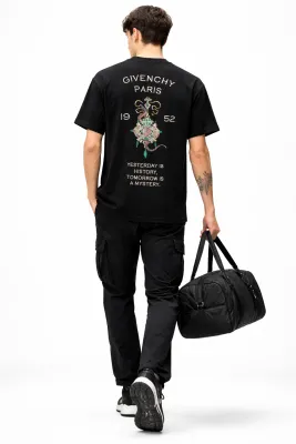 Designer tee shirts mens back walking pose with sports bag studio model shot