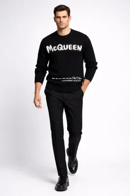 Alexander McQueen black logo sweater men luxury designer knitwear streetwear outfit walking model style