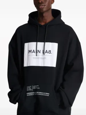 balmain logo print hoodie men logo close up black print premium cotton detail