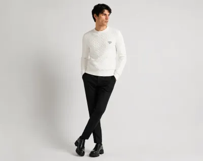 Prada white knit sweater mens luxury editorial pose with modern tailored monochrome styling