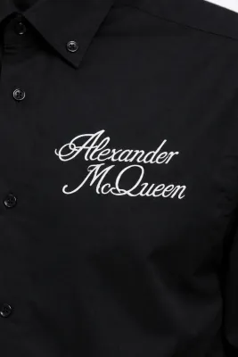 Alexander McQueen logo embroidered black shirt close up mens designer shirt luxury fashion detail