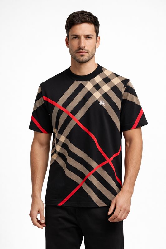 Male model wearing Burberry black check pattern t-shirt with red stripe detail luxury designer men's outfit front view
