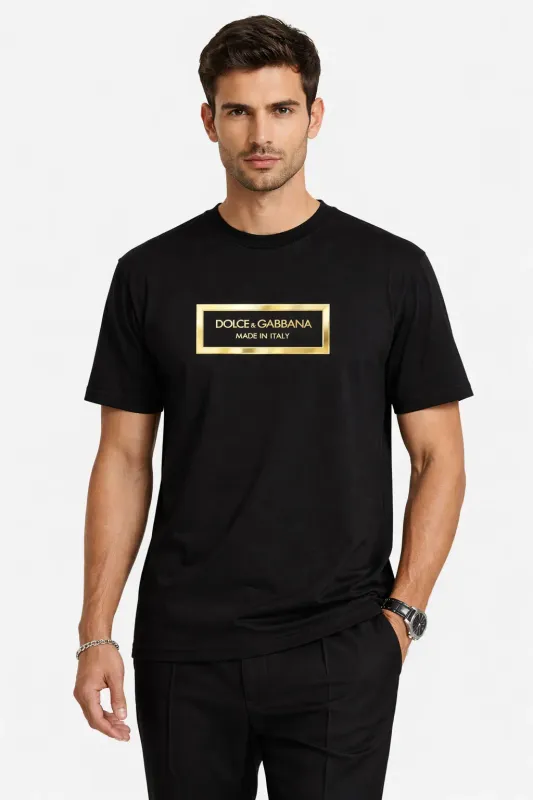 male model wearing dolce gabbana metal logo black designer t shirt luxury fashion