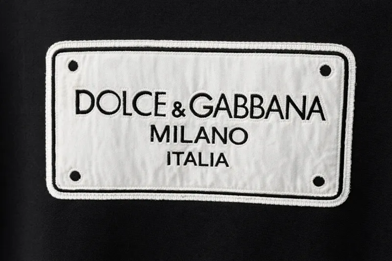 Mens black and white designer t shirt luxury designer t shirts for men logo close up detail