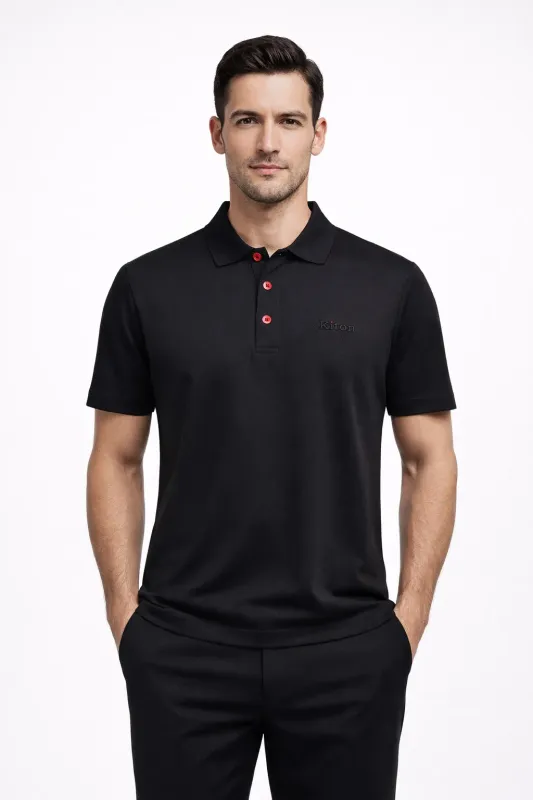 Kiton Napoli black polo shirt on male model with signature red buttons straight pose