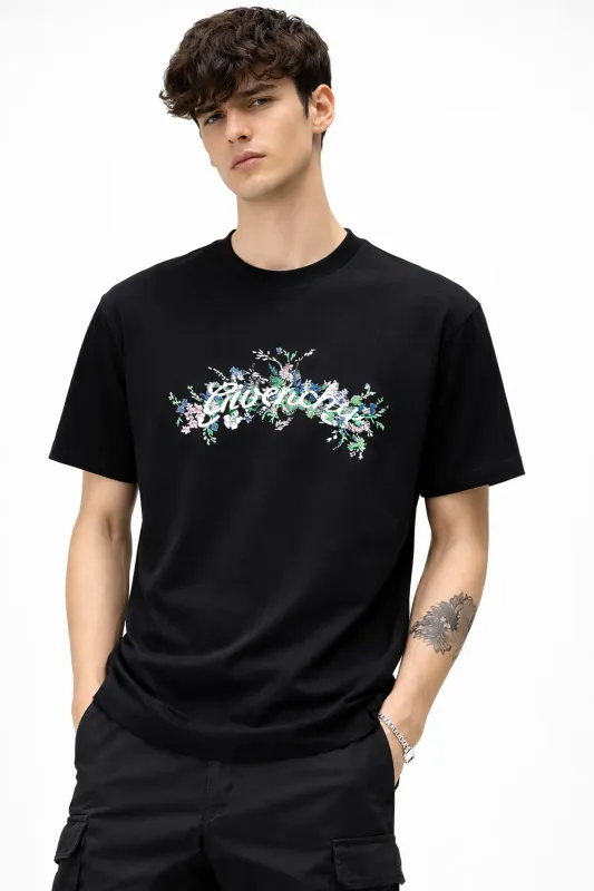 Givenchy black men's t-shirt with floral embroidered front logo on model