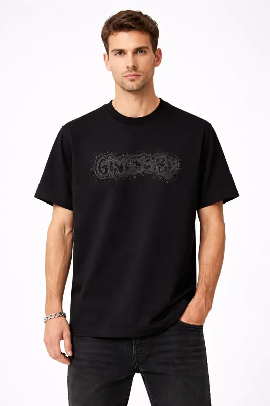 Male model wearing black Givenchy rhinestone designer mens tee in front pose