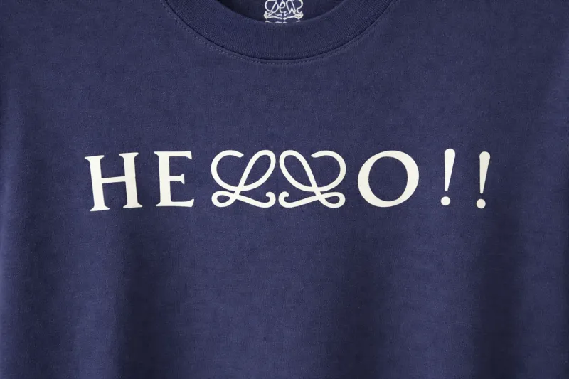 Loewe navy blue men’s t-shirt hello print logo close-up detail view