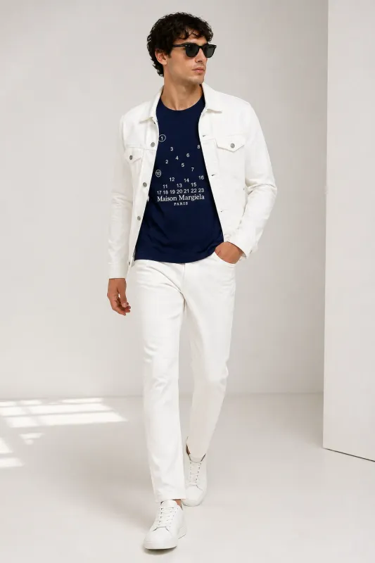 Maison Margiela navy blue embroidery t shirt men walking pose white denim jacket white pants outfit