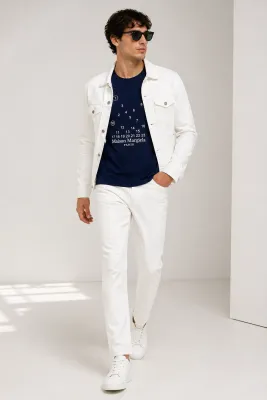 Maison Margiela navy blue embroidery t shirt men walking pose white denim jacket white pants outfit