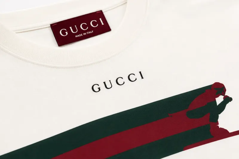 Gucci white ski print t shirt men logo and stripe close up detail