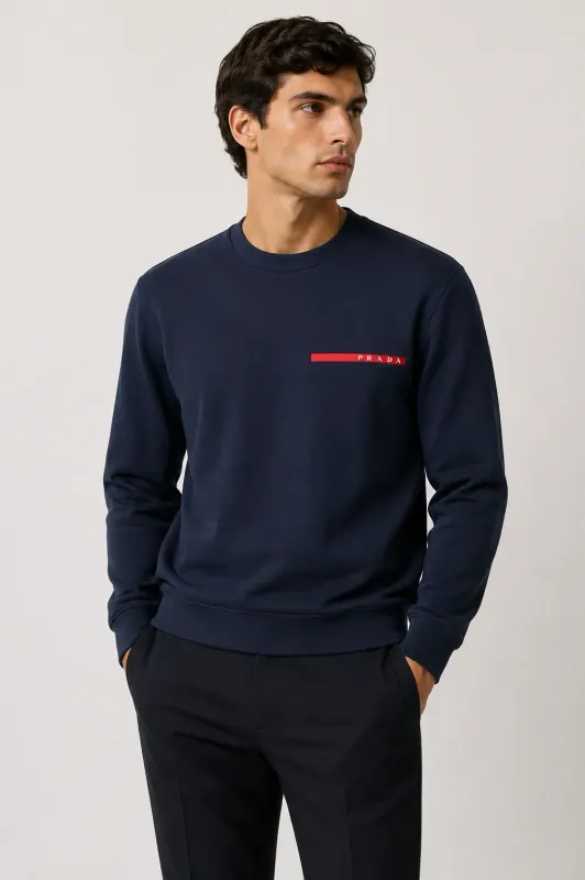 prada navy blue sweatshirt men model front fit red logo detail