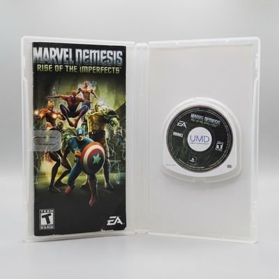 Open case showing the manual and UMD disc for Marvel Nemesis: Rise of the Imperfects on PSP