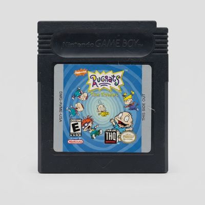 Front view of the black Rugrats: Time Travelers cartridge for Game Boy Color with an illustrated blue label