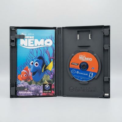 Finding Nemo: The Video Game for Nintendo GameCube open case showing the blue instruction manual and orange disc
