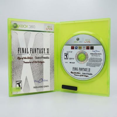 Final Fantasy XI Online for Xbox 360 open green case showing the disc and manual contents
