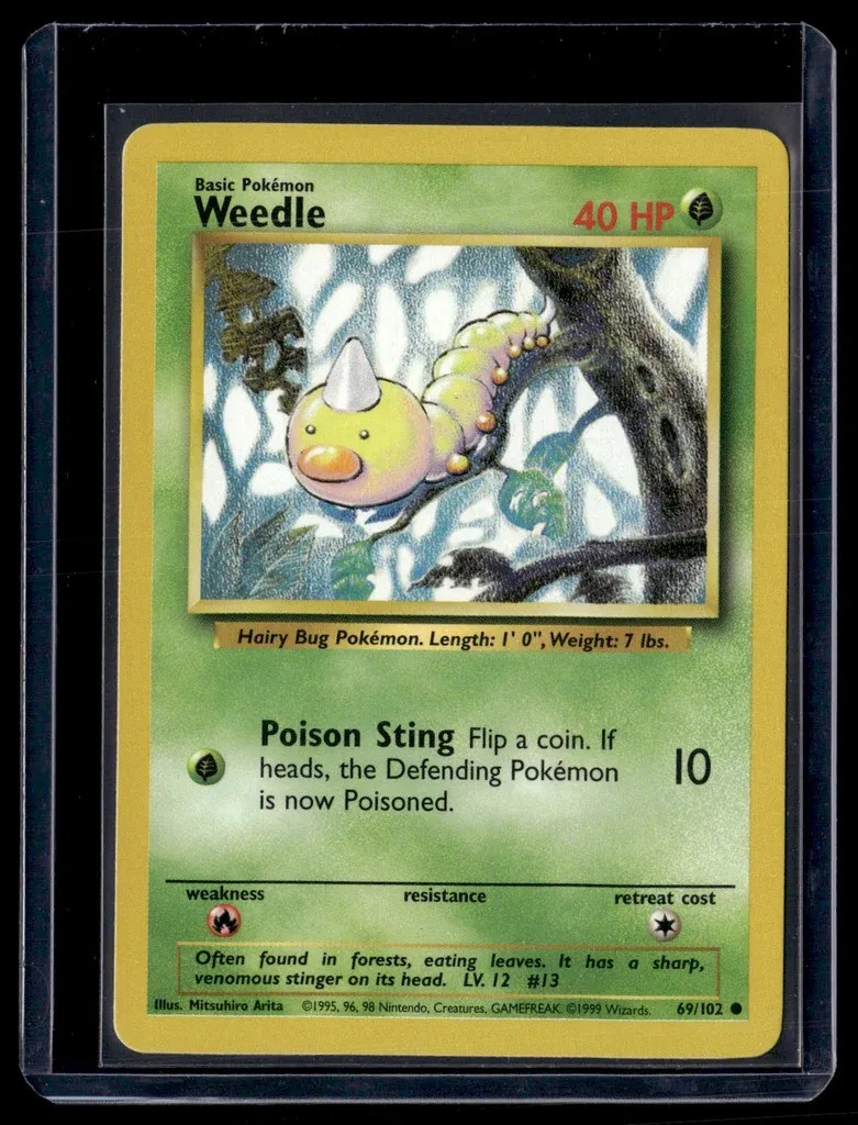Front of Weedle #69/102 from Base Set, a Common Pokémon trading card in Near Mint condition.