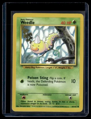 Front of Weedle #69/102 from Base Set, a Common Pokémon trading card in Near Mint condition.